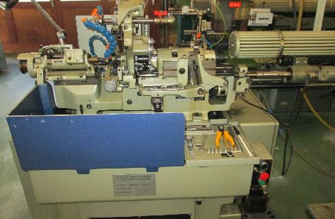 TORNOS MS7 SLIDING HEAD LATHE WITH SUPER TELEBAR AND 12U COMBINED ATTACHMENT